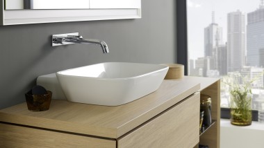 Washplace with Geberit ONE lay-on washbasin and bathroom furniture made of wood